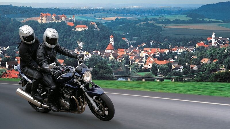 Motorcycle ride through scenic landscape