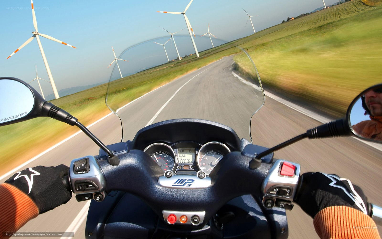 Motorcycle ride with wind turbines