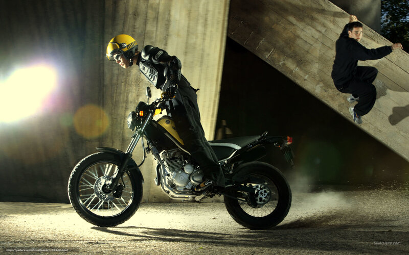Motorcycle rider and parkour athlete