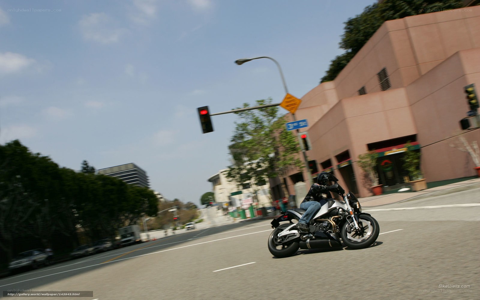 Motorcycle rider at intersection
