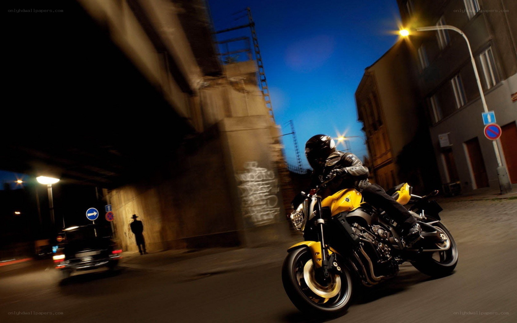 Motorcycle rider at night