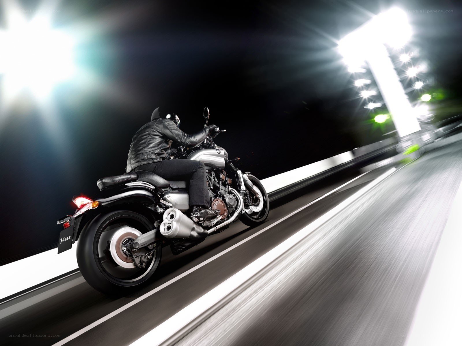 Motorcycle rider at night