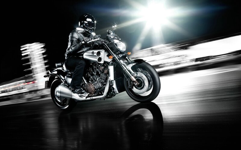motorcycle rider at night