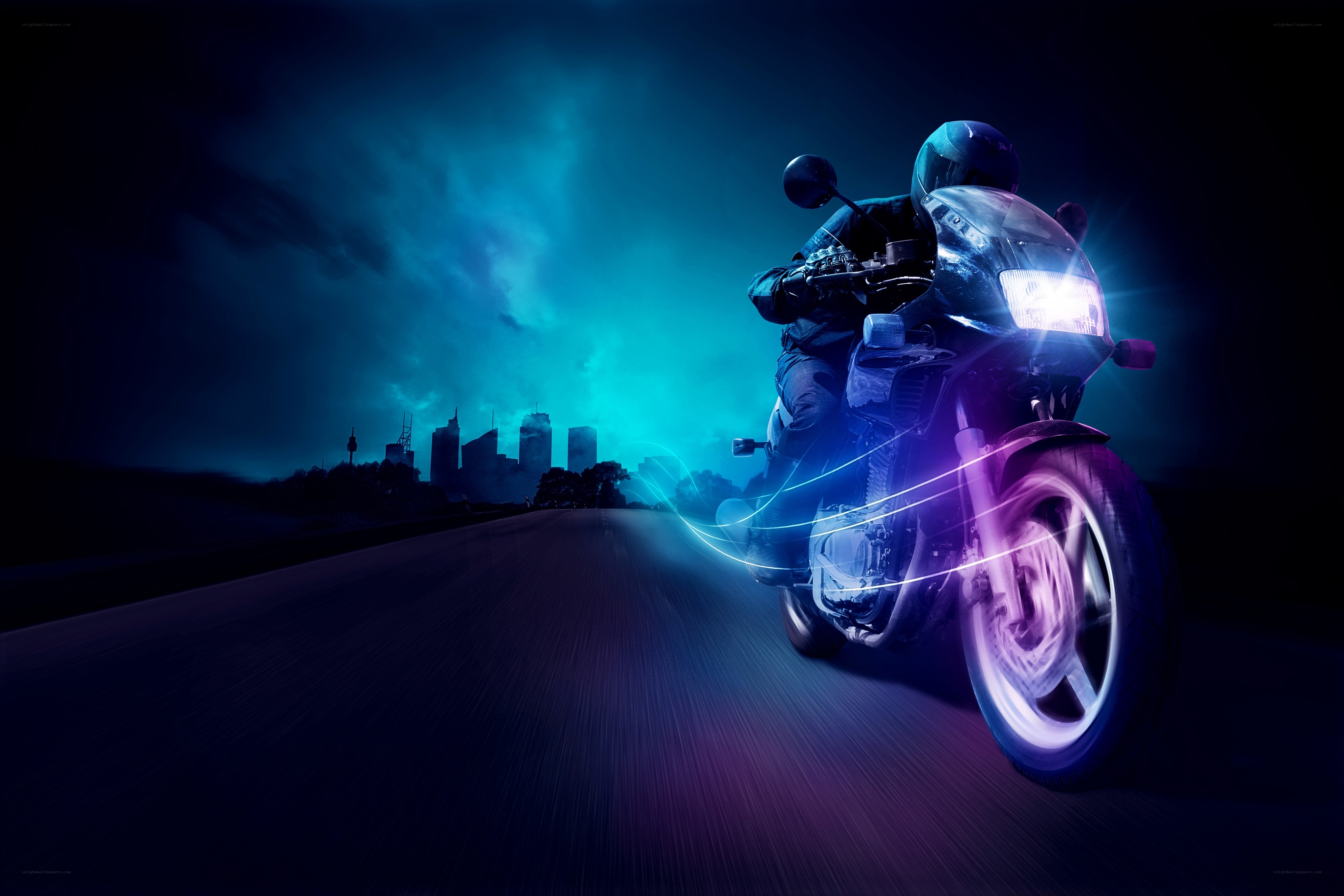 Motorcycle rider at night