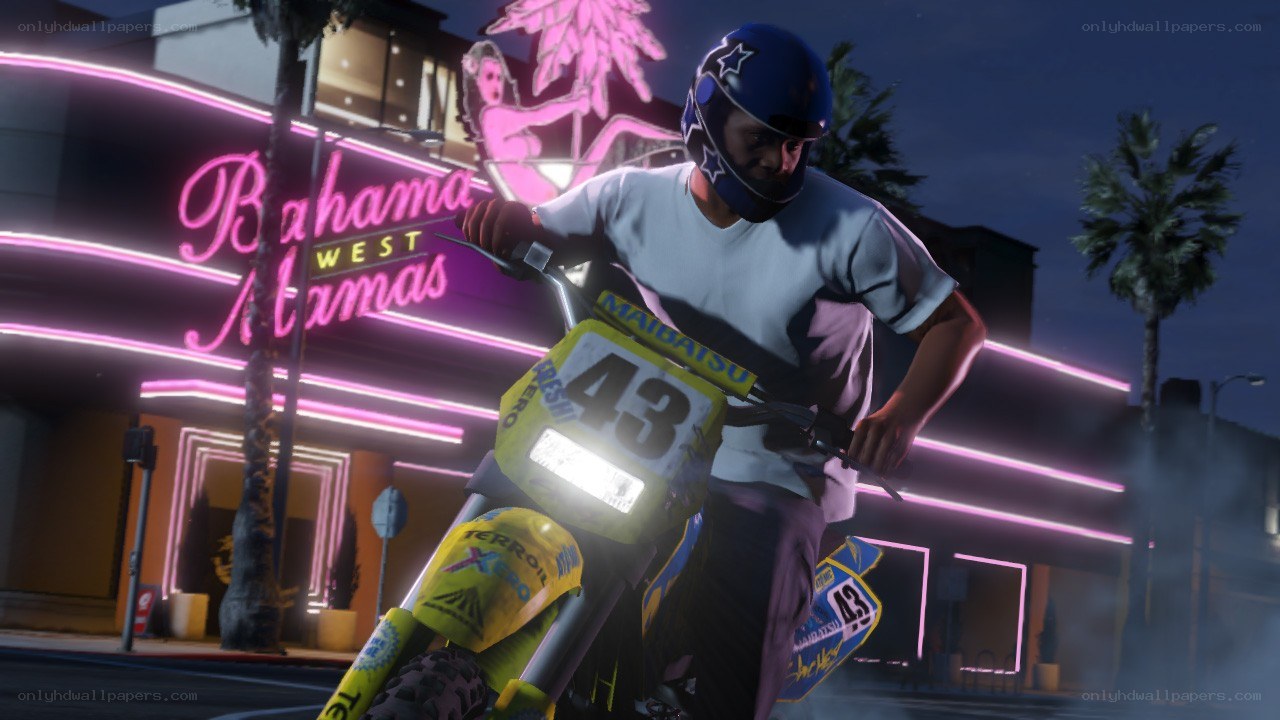 motorcycle rider at night
