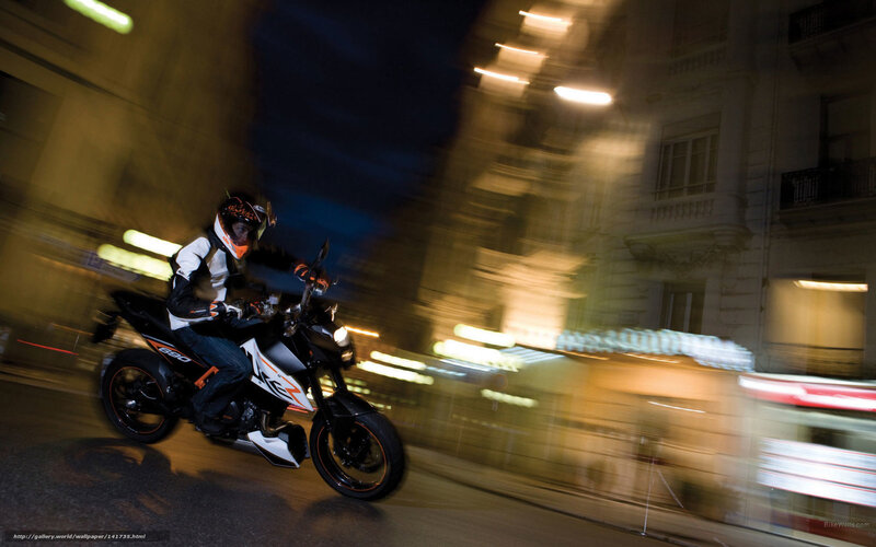 Motorcycle rider at night