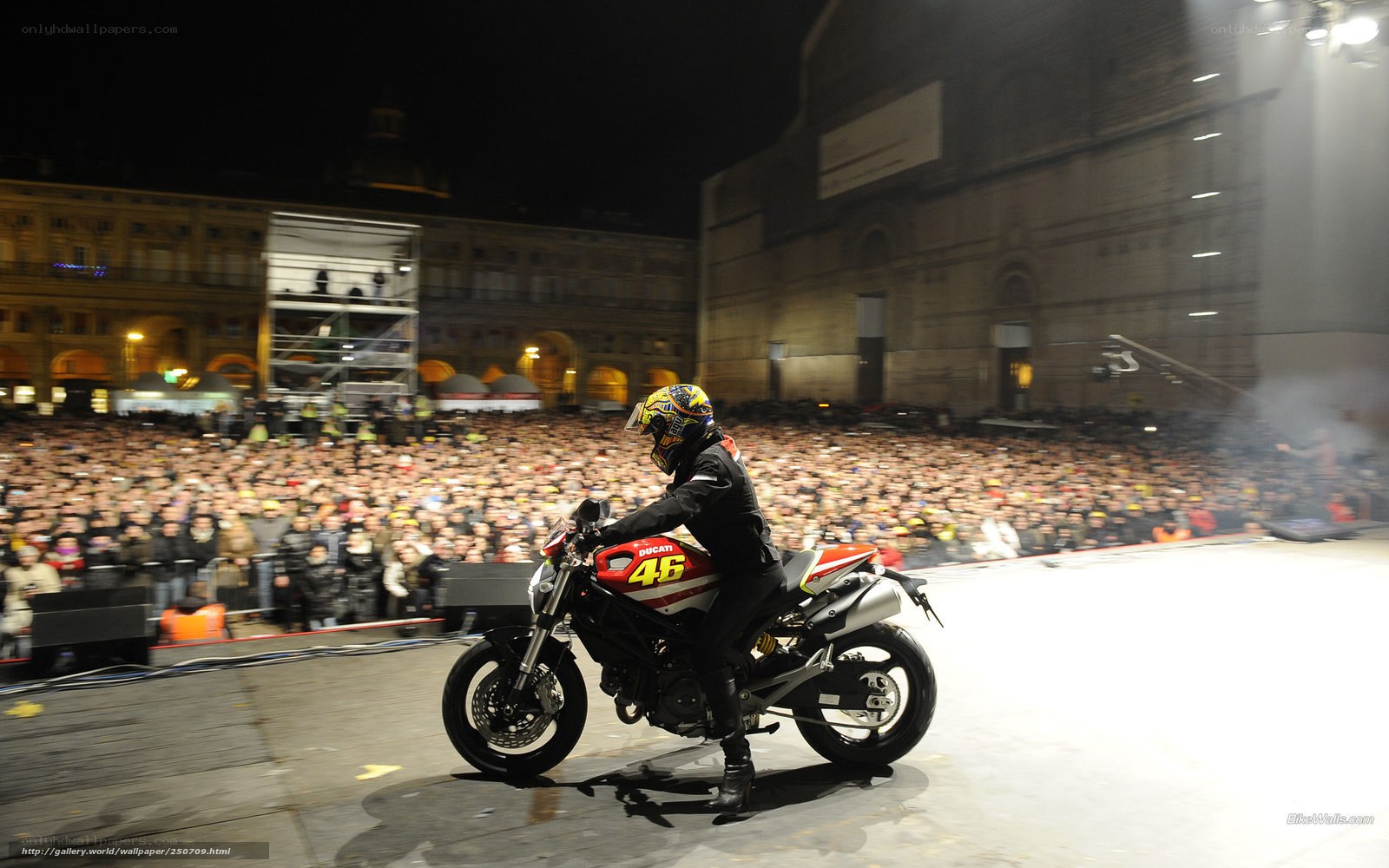 Motorcycle rider at night event