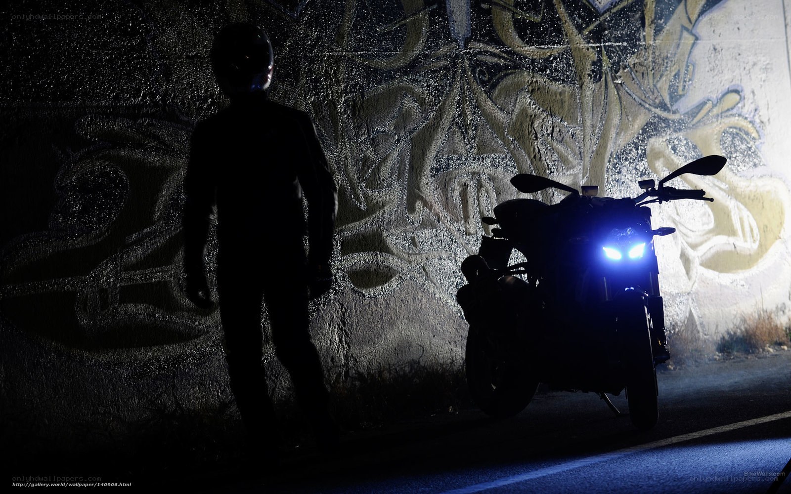 Motorcycle rider at night