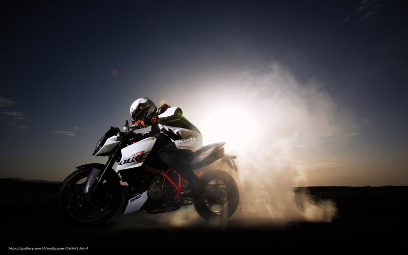motorcycle rider at sunset