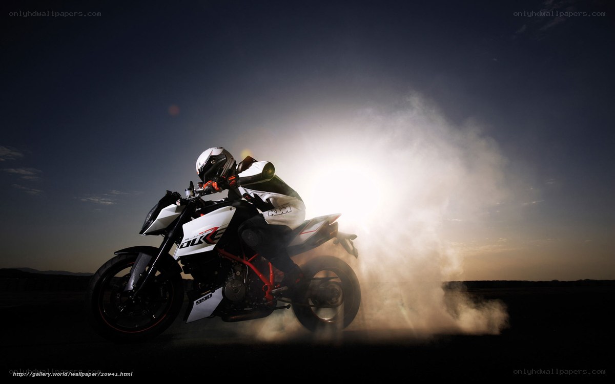 motorcycle rider at sunset