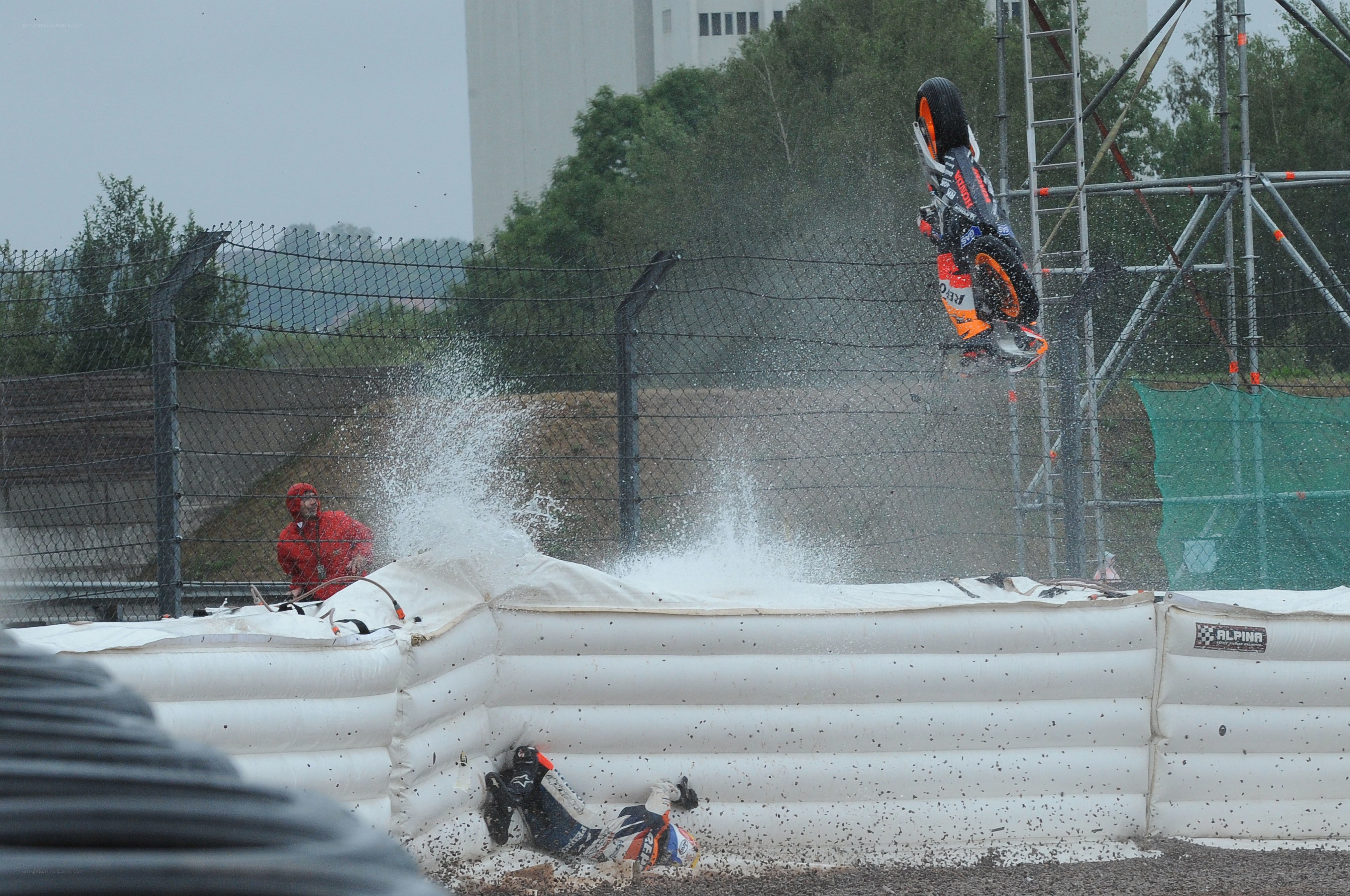 Motorcycle rider crashes into inflatable barrier