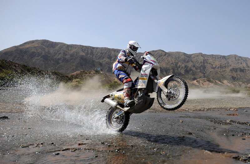 Motorcycle rider crossing water