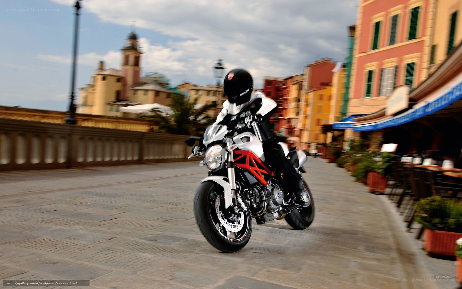 Motorcycle rider in a European town