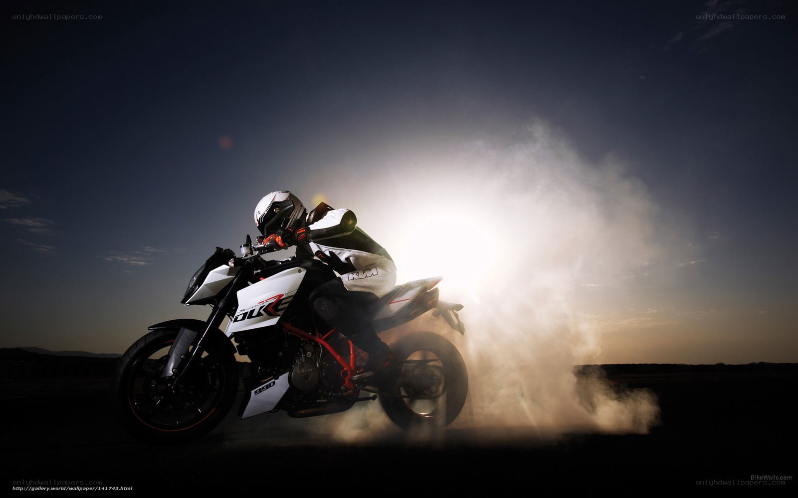 Motorcycle rider in dust