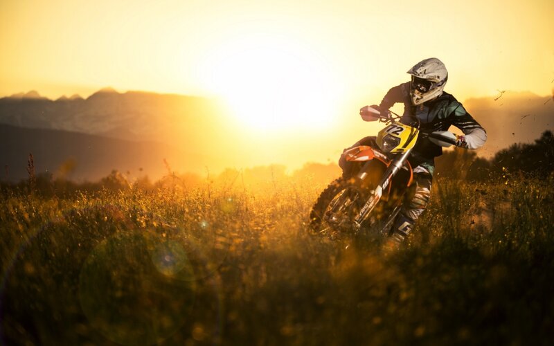 Motorcycle Rider in Field