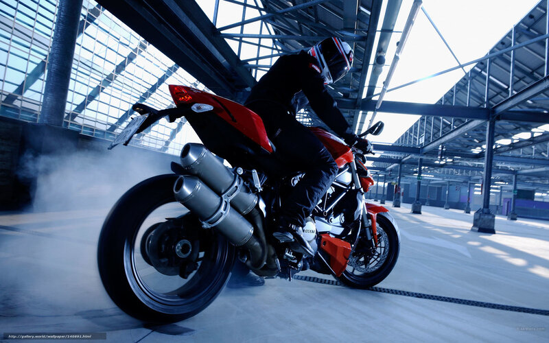 motorcycle rider in industrial space