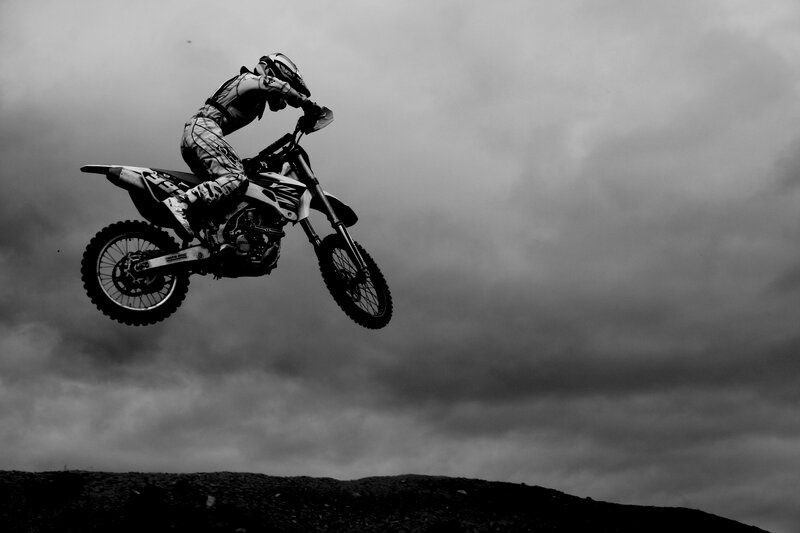 Motorcycle Rider in Mid-air — Black, Dramatic