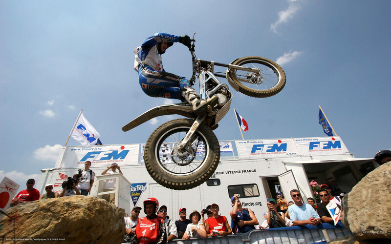 Motorcycle Rider in Mid-air — Blue, Dynamic, Afternoon, Photograph, Crowd