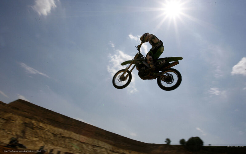 Motorcycle Rider in Mid-air — Blue, Dynamic, Afternoon