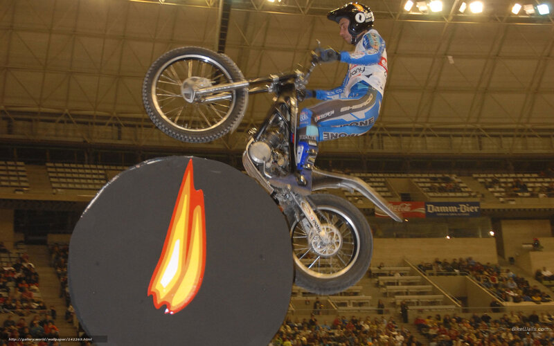 Motorcycle Rider in Mid-air — Blue, Dynamic, Photograph, Crowd