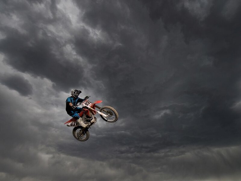 Motorcycle Rider in Mid-air — Gray