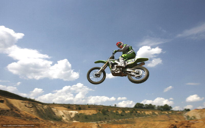 Motorcycle Rider in Mid-air — Green, Dynamic, Afternoon