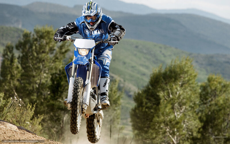 Motorcycle rider in mid-air jump