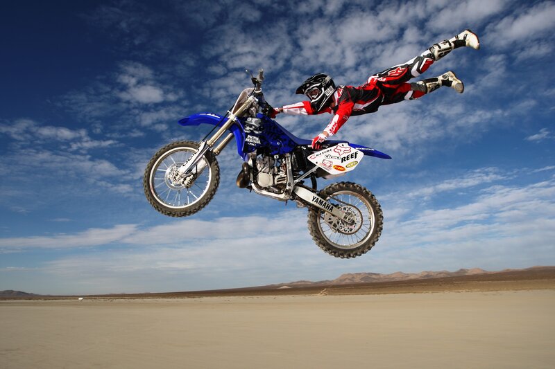 motorcycle rider in mid-air jump