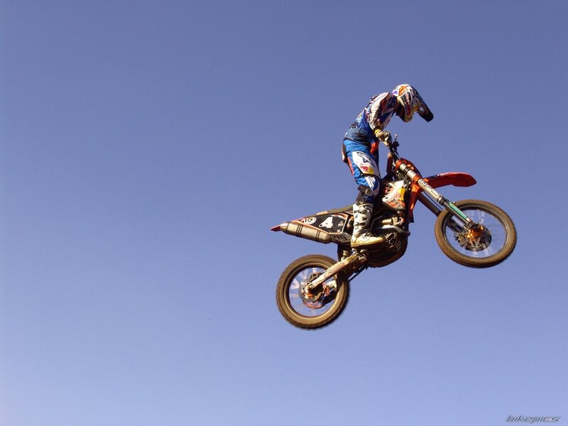motorcycle rider in mid-air jump