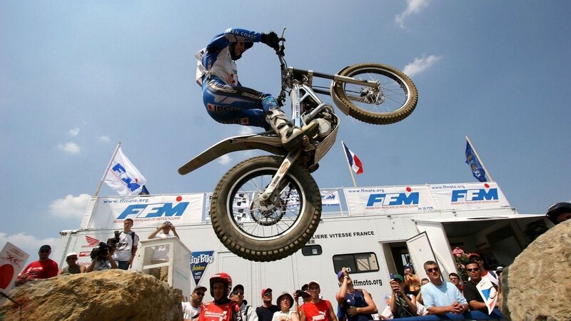 Motorcycle rider in mid-air jump
