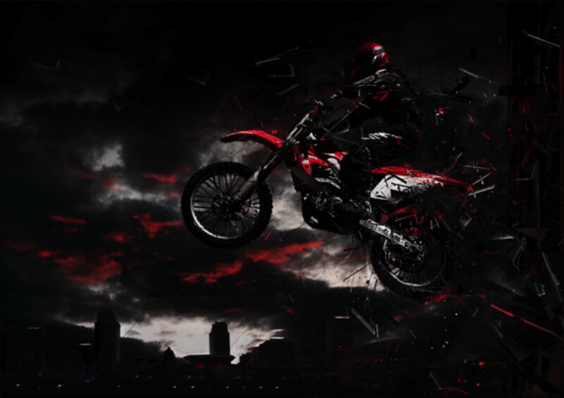 Motorcycle rider in mid-air jump