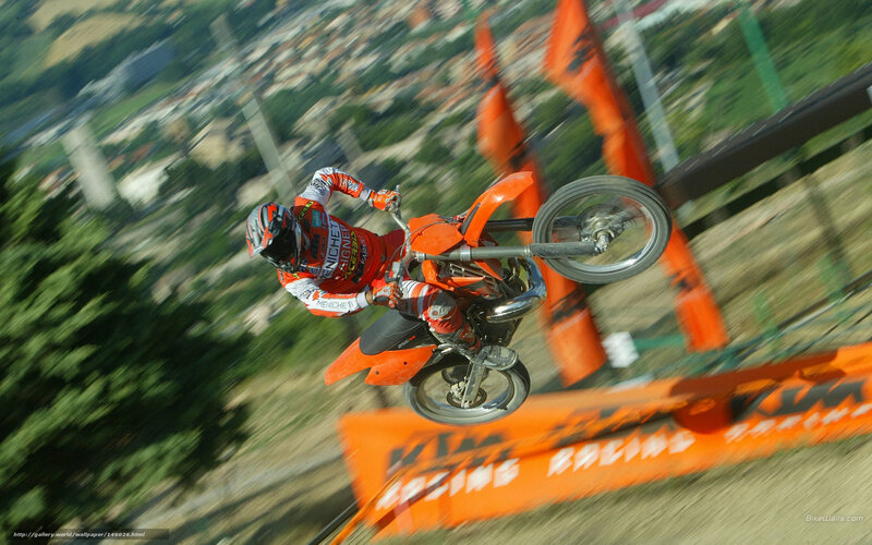 Motorcycle Rider in Mid-air — Orange, Dynamic, Afternoon, Photograph