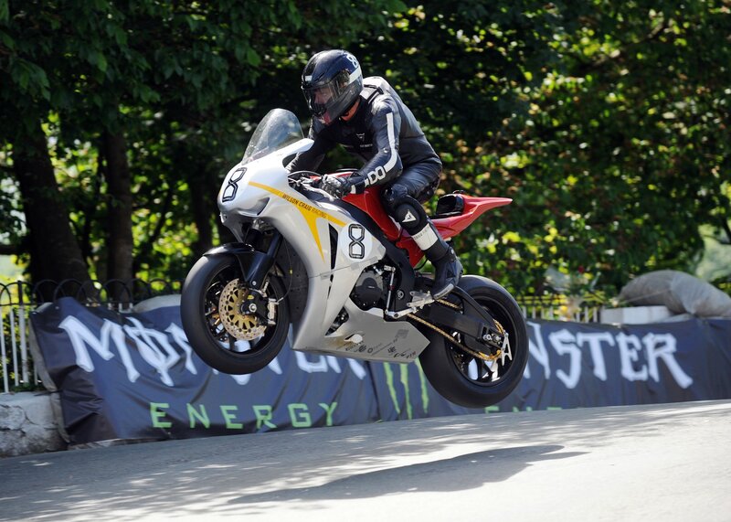 Motorcycle Rider in Mid-air — White