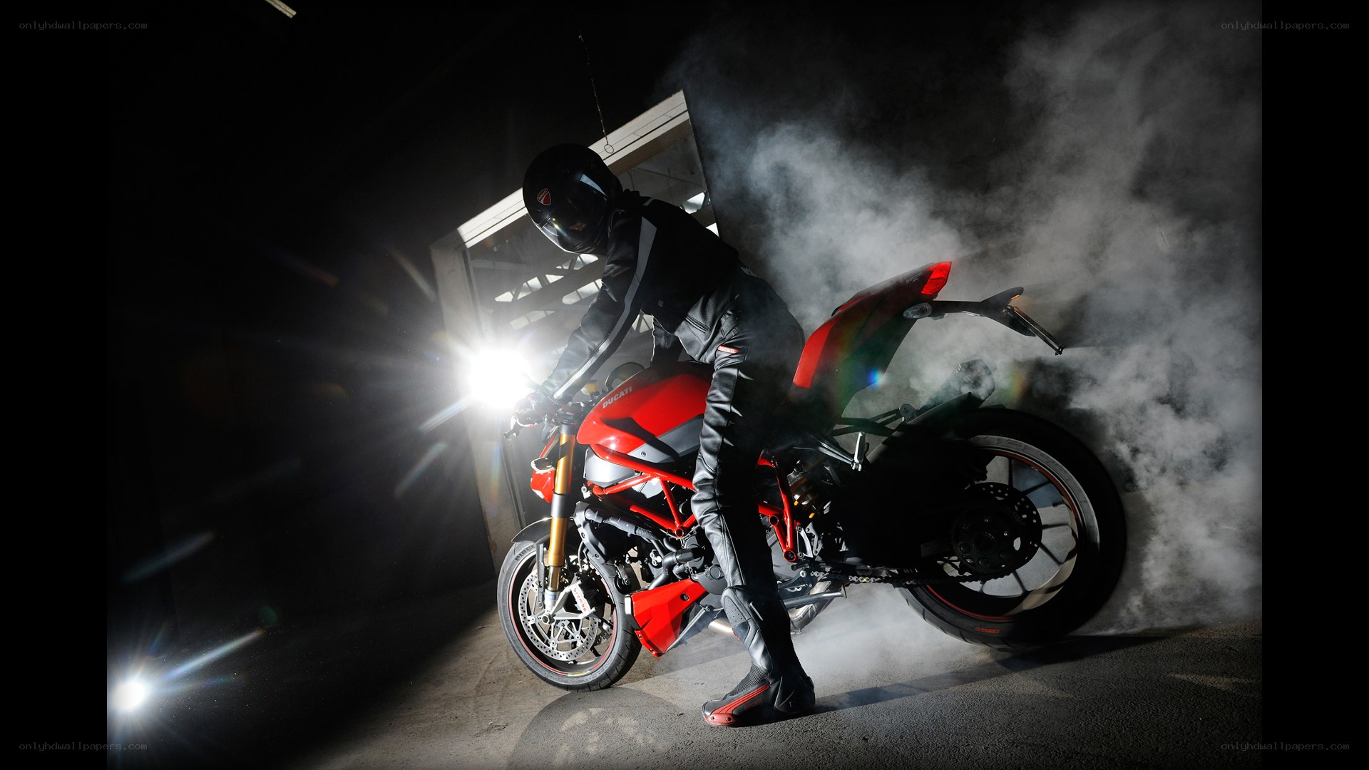 Motorcycle rider in smoke