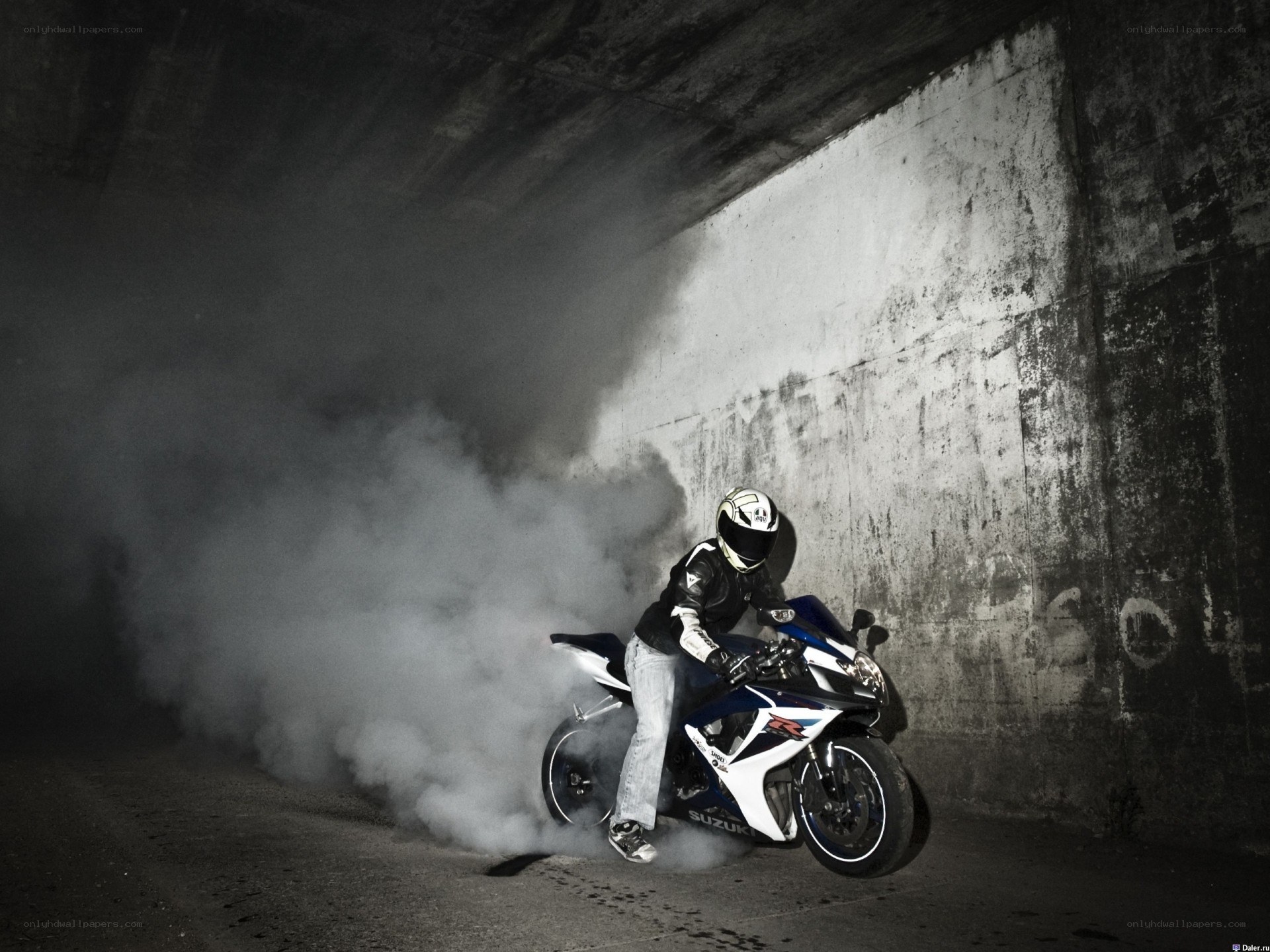 Motorcycle rider in tunnel