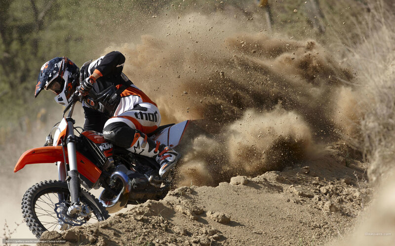 Motorcycle Rider Kicking Up Dirt
