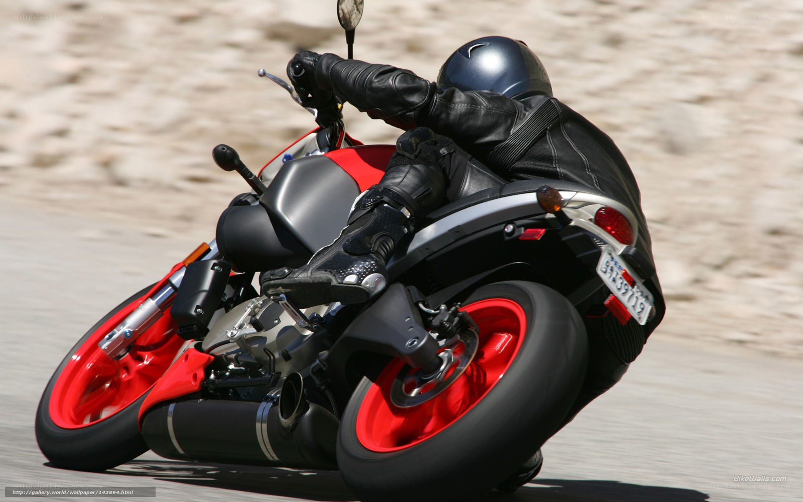 Motorcycle rider leaning in turn
