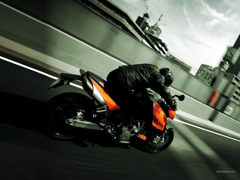 Motorcycle rider on a city highway
