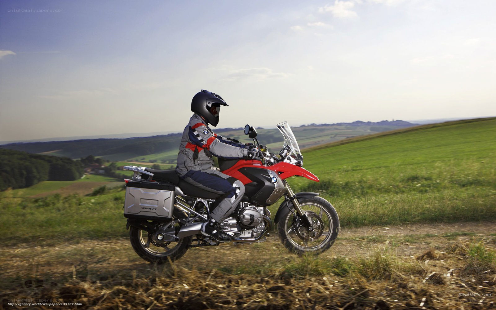 Motorcycle rider on a country path