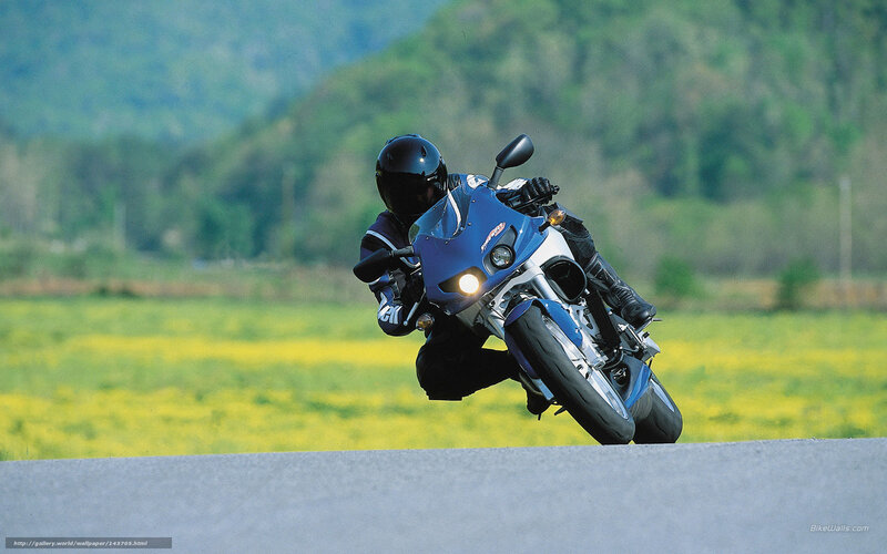 Motorcycle rider on a country road