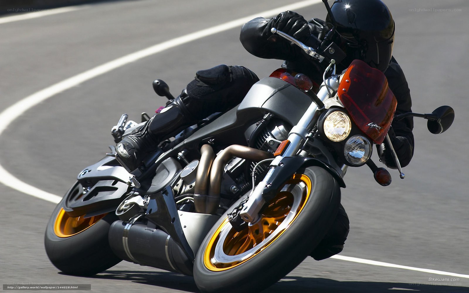 Motorcycle rider on a curve
