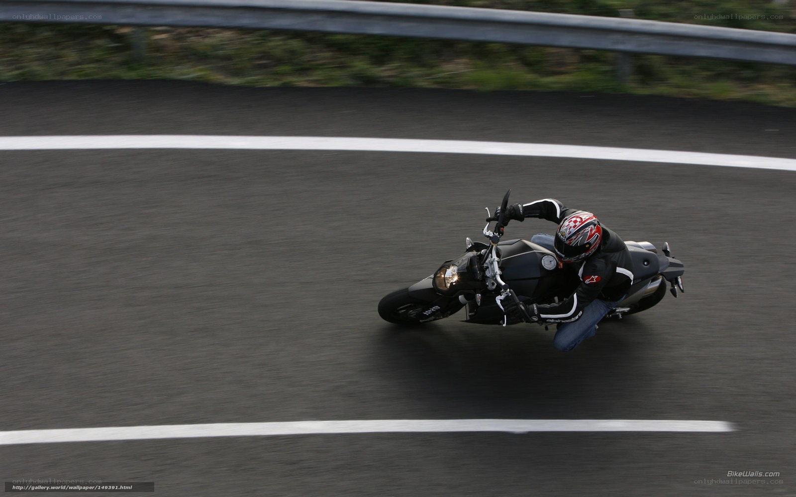 motorcycle rider on a curve