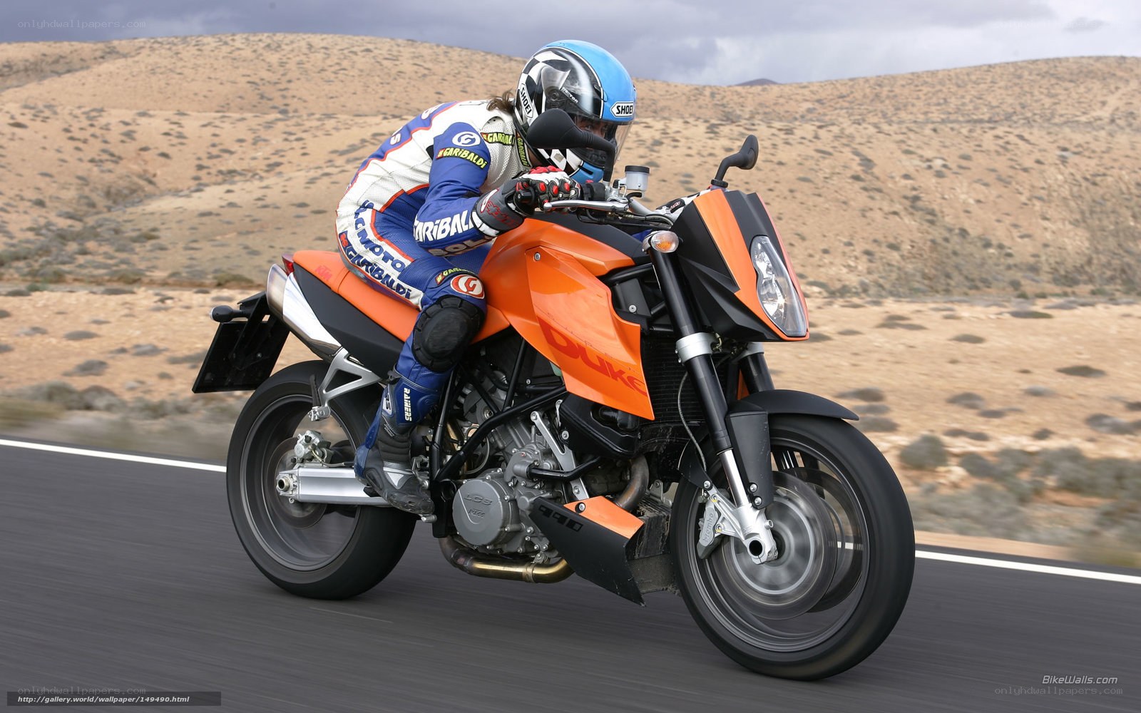 motorcycle rider on a desert road