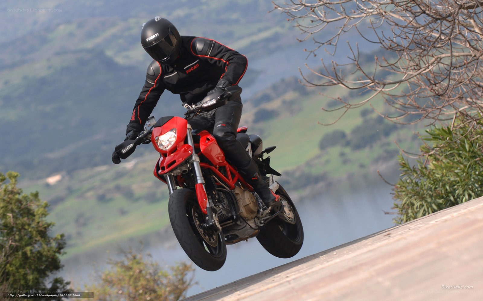 Motorcycle rider on a red bike