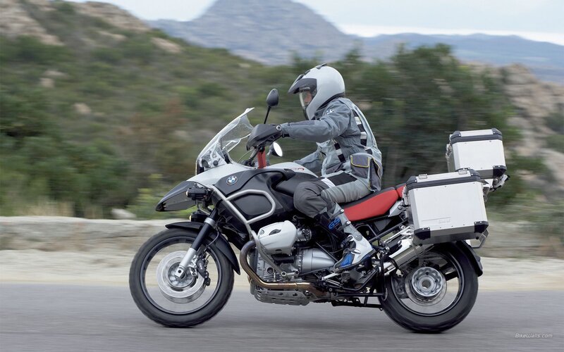 motorcycle rider on a scenic road