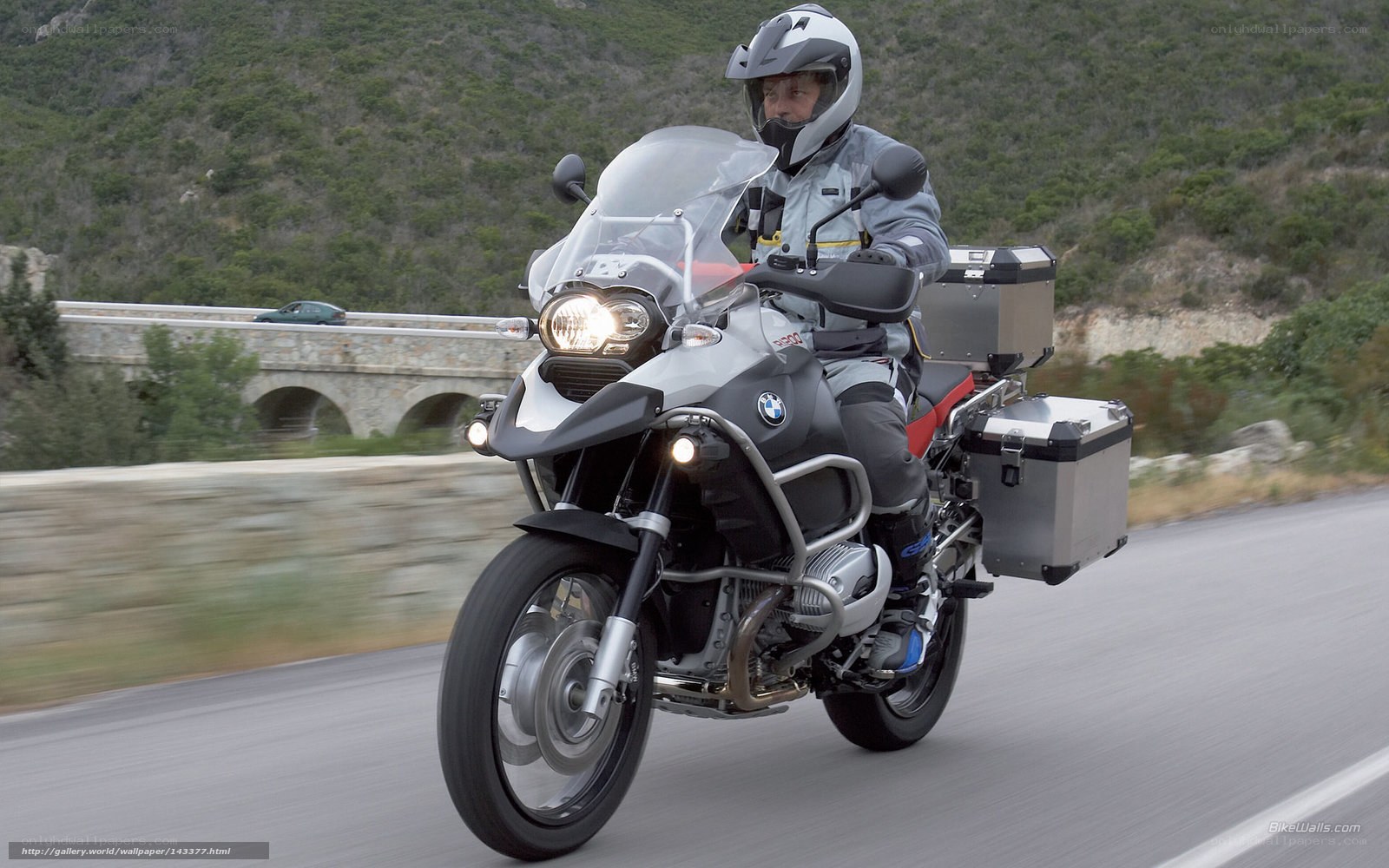 motorcycle rider on a scenic road