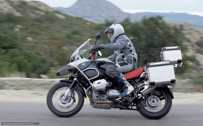 motorcycle rider on a scenic road