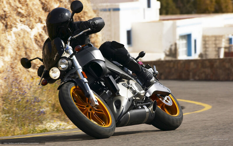motorcycle rider on a winding road