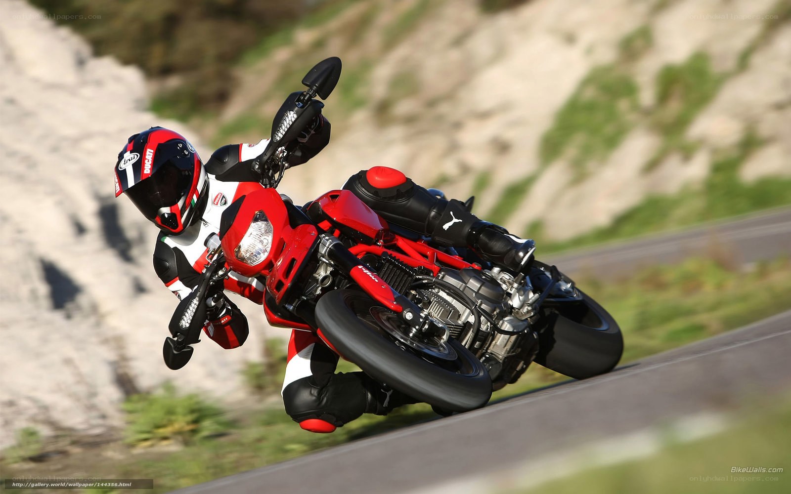 motorcycle rider on a winding road