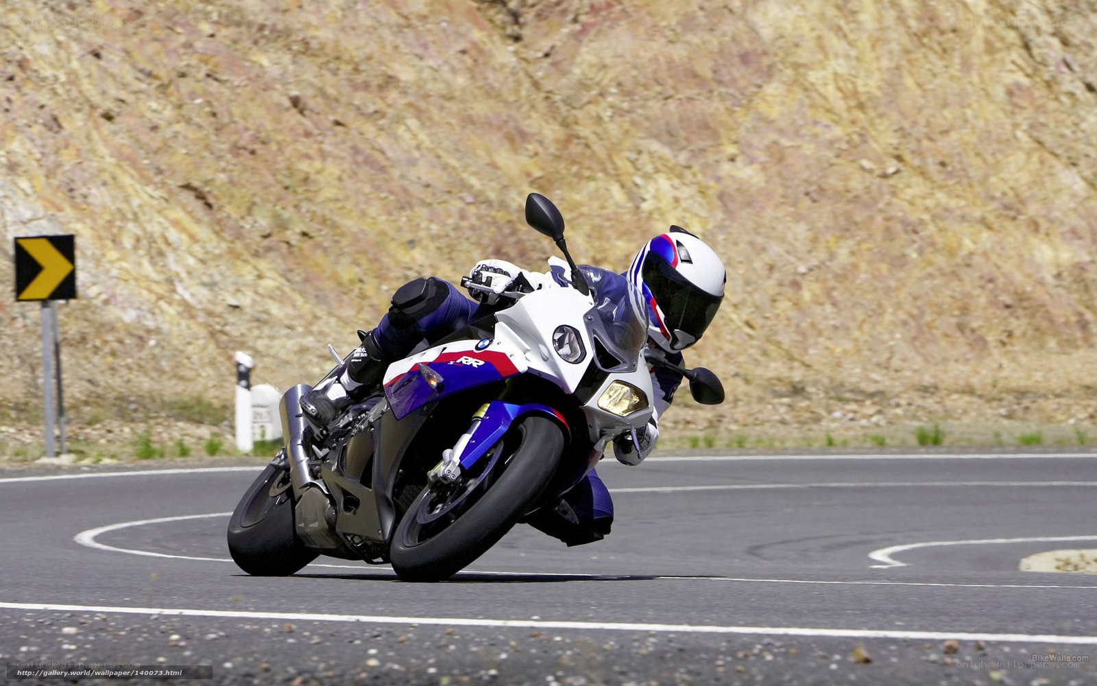 motorcycle rider on a winding road